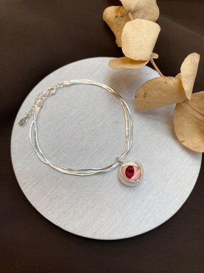 Fewness: three-strand small rose bracelet