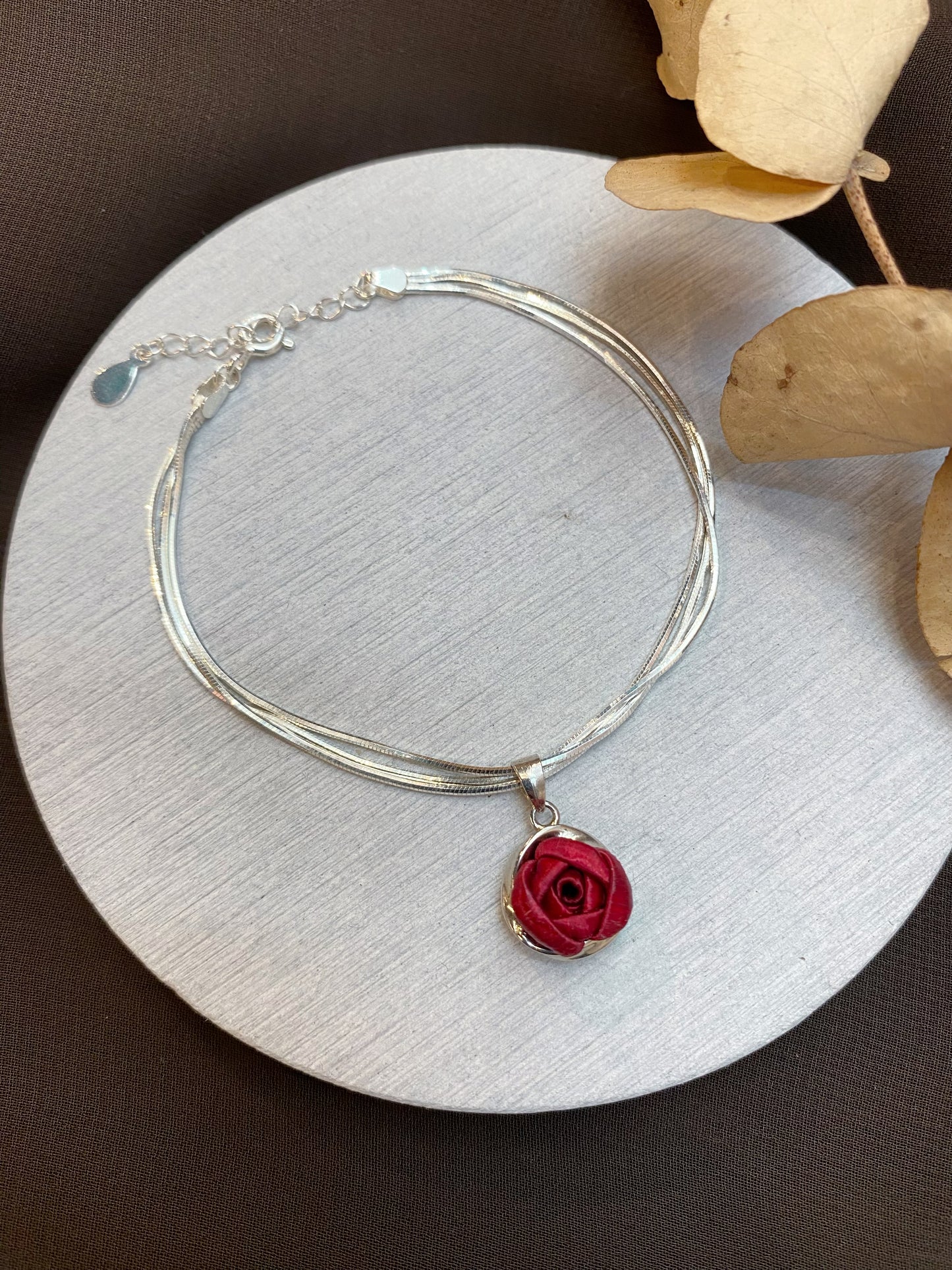 Fewness: three-strand small rose bracelet